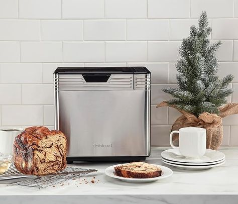 Cuisinart-quality technology promises superior crust, color and texture.UC Cubic Feet: 1.180, MC Cubic Feet: 1.350.MC Cubic Feet: 1.350, MC Cubic Feet: 1.350 12 preprogrammed menu options - fully automatic, easy to use 3 crust shades - light, medium, or dark & bakes up to a 2 pound loaf Vertical baking pan for counter-friendly compact design - removable kneading paddle and bread pan Lid with viewing window to monitor the process - interior light to check bread as it bakes - sleek design, healthy Gluten Free Loaf, Bread Maker Machine, Dough Starter, Bread Makers, Must Have Kitchen Gadgets, Sour Dough, Bread Making, The Bakery, Bread Maker