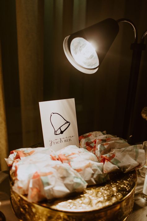 Taco bell tacos and sign layout at s wedding Hotel Haya, wedding planned by Oh My Occasions #tacobellwedding #tacobellmidnightsnack #tacobellweddingsnack #WeddingAesthetic #WeddingDay #WeddingPhotography #WeddingInspo #WeddingIdeas #HotelHayaWedding #HotelHaya #OhMyOccasions #SouthFloridaWedding #TampaFloridaWedding #LuxuryWeddingPlanner #WeddingPlanner Taco Bell At Wedding, Taco Bell Late Night Wedding, Late Night Food Wedding, Vegas Taco Bell Wedding, Late Night Snacks Wedding, Taco Bell Wedding Catering, Taco Bell Wedding Las Vegas, Taco Bell Catering, Late Night Taco Bell Aesthetic