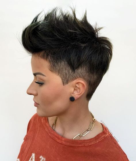 Short Female Haircut with Shaved Sides and Back Short Female Haircut, Shaved Sides And Back, Female Haircut, Pixie Undercut, Low Taper, Under Cut, Asymmetrical Pixie Cuts, Edgy Pixie Haircuts, Pixie Cut With Undercut