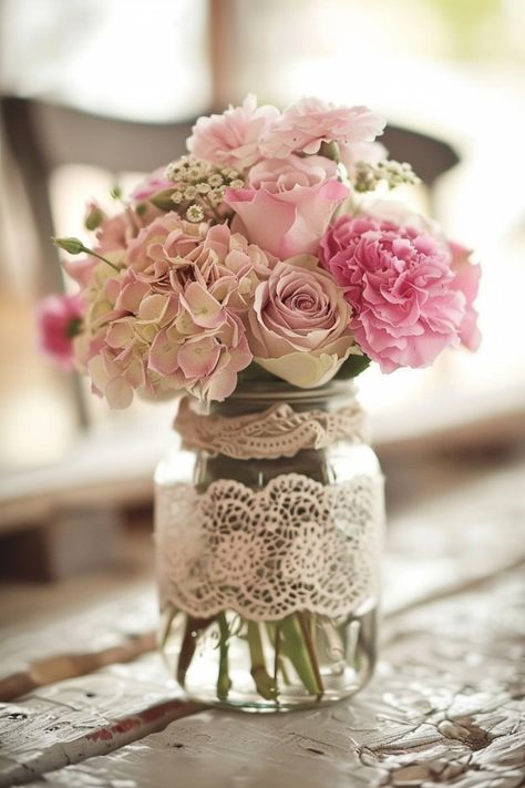 Floral centerpieces are always in style, offering endless ways to make your wedding unique. See more ideas here. Pink Floral Center Piece, Pink Fall Centerpieces, Baby Shower Flower Centerpieces, Natural Flower Arrangements, Simple Wedding Centerpieces Diy, Blush Pink Wedding Centerpieces, Floral Wedding Centerpieces, Woodland Wedding Centerpieces, Shabby Chic Centerpieces