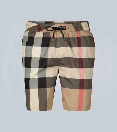 These regular-fit Burberry swim shorts are printed with a large beige check and have side pockets, a zipped back pocket and a mesh lining. Burberry Swimwear, Burberry Swim, Burberry Shorts, Billabong Swim, Burberry Classic, Beige Shorts, Luxury Baby, Colour Beige, Printed Swim