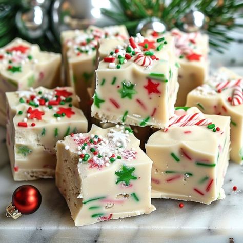 Easy Sugar Cookie Christmas Fudge, is a merry confection that combines the beloved flavors of sugar cookies and creamy fudge into one irresistible treat. Perfect for holiday gatherings, cookie exchanges, Sugar Cookie Fudge Christmas, Sugar Cookie Christmas Fudge, Christmas Inspired Desserts, Holiday Treats To Sell, Christmas Cookie Fudge, Christmas Desserts Easy Quick, Birthday Fudge, Easy Christmas Cookies For Exchange, Christmas Goodies For Gifts