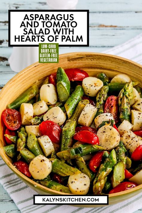 "Pinterest Image of Asparagus and Tomato Salad with Hearts of Palm showing salad in stoneware bowl on striped napkin." Salad Asparagus, Salad Dressing Recipes Vinaigrette, Hearts Of Palm Salad, Salad Tomato, Hearts Of Palm, Vegan Fish, Salad Vegan, Fresh Salad Recipes, Low Carb Salad