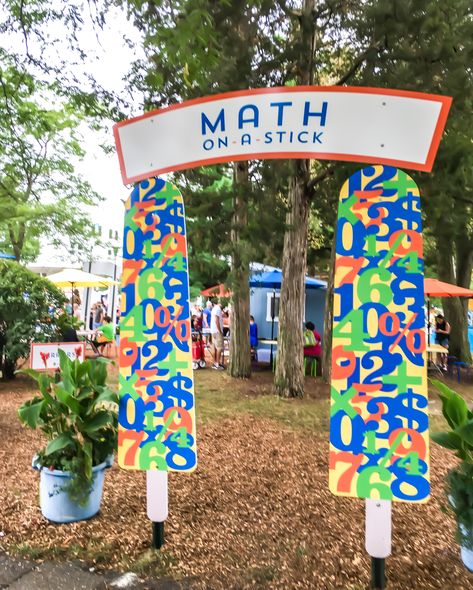 The State Fair has everything on-a-stick — even math! The Math On-A-Stick experience is a welcoming space where kids and grown-ups can explore fun math concepts at the fair. Play with geometric and reptile-shaped tiles to create designs and patterns. Sort, count and look for what's the same and what's different in groups of colored eggs on captivating cards. Math Fair Ideas, Shaped Tiles, Maths Day, Colored Eggs, Math Projects, Fair Play, Coloring Eggs, Math Concepts, Fashion Scarf