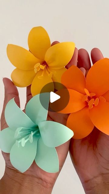 Lebo M on Instagram: "Happy Friday!💛🩵🧡🤗 you can find this template and many more in my Etsy shop. Link in my bio🌸 - - - #paperflowers #tropical #yellow #lilies #paperflorist #orange #papercrafts #etsy #spring #diypaperflowers #colorful #etsyshop #lily #fallflowers #artandcraft #handmade #love #papercrafts #instaflower #beautiful #paperart #sunshine #floresdepapel #cricutmade #fallcrafts #videotutorial #paper #paperartist #flowers #diycrafts" Colour Paper Flower Craft, Diy Hibiscus Flower Paper, Tropical Paper Flowers Diy, Yellow Lilies, Birthday Party Treats, Diy Flores, Orange Paper, Paper Flower Crafts, Flower Template