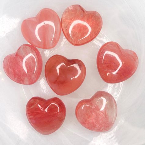 This listing is for 1 Cherry Quartz Pocket Heart100% Natural Cherry QuartzEach stone is hand-carved into a lovely heart.Measures at approximately 30-35mm.Please allow variances in shape, size, and hue due to the natural state of the stone.Cherry Quartz can help diffuse strong emotions like anger, tension, jealousy, or fear. It will replace it with feelings of calm, peace, and serenity.Our Stones and crystals are great for altars, grids, pocket stones, gifts, home decorating, collecting and more! Pocket Hearts, Pocket Heart, Strong Emotions, Cherry Quartz, Stones And Crystals, Anger, Hand Carved, Cherry, Carving