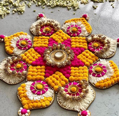 New pom pom rangoli Size 28 inch DM us for more details or WhatsApp us on 9867422790 Diwali Party Decor, Aesthetic Rangoli, Side Rangoli, Floral Rangoli, Diwali Diya Decoration, Indian Wedding Gifts, Round Candle Holder, Rangoli Designs Photos, Diwali Decorations At Home