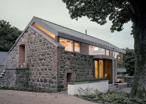 Traditional stone barn updated with a steel-framed living space. Stone Facade, Stone Barns, Casas Coloniales, Exterior Cladding, Barn Conversion, Modern Barn, Hus Inspiration, House Extensions, Stone Houses