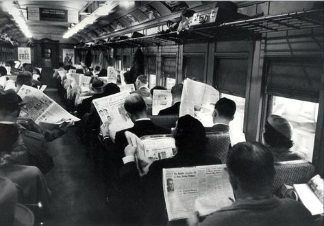 2. What's interesting about this image is not its obvious display of antisocial behaviour, but the volume of information. These people are consuming nearly all of the same information brought to them by a single source. Subway Train, People Reading, Louis Armstrong, E Learning, Giza, Anti Social, Sociology, White Photo, Keanu Reeves