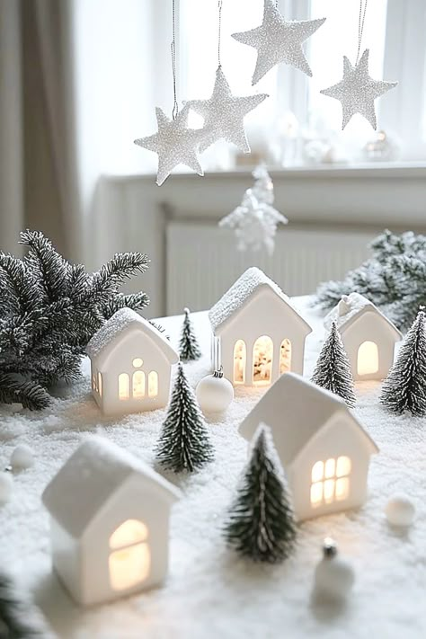 Small White Houses Christmas Decor, Winter Wonderland Village, Winter Wonderland Decorations House, White Village Christmas Houses, White Christmas Village Display, Winter Wonderland Decorations Christmas, Winter Wonderland Christmas Decorations, White Christmas Aesthetic, Floating Christmas Tree