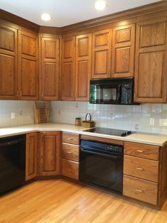 Modern Honey Oak Kitchen, Modern Oak Kitchen, White Beveled Subway Tile, Oak Kitchens, Kitchens White, Countertops Black, Kitchen Cabinets Pictures, Honey Oak Cabinets, White Oak Kitchen