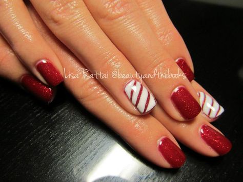 Red Shellac with an accent nail done in a candy cane. Adorable Christmas nails.  Nail Artist: Lisa Rattai  Twitter: @beautynthebooks  Instagram: @beautyandthebooks Christmas Shellac Nails Designs, Christmas Shellac, Red Shellac Nails, Christmas Shellac Nails, Red Shellac, Shellac Ideas, Shellac Nail Designs, Christmas Candy Canes, Nails Shellac