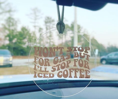 "Our \"I'll stop for iced coffee\" car charm is the perfect accessory for any coffee lover on the go. This adorable charm is made of durable acrylic and features a cute design with the phrase \"I'll stop for iced coffee\" on it. Hang it from your rearview mirror or anywhere else in your car to show off your love for that sweet, refreshing drink. Not only is it a fun and trendy accessory, but it's also a great conversation starter. So if you're always on the lookout for the next best iced coffee spot, this charm is a must-have for your car. Each charm is 3\" in diameter on acrylic. The vinyl is completed in heat transfer vinyl to avoid peeling. Strung with suede cord, open at the top so you can hang at the length your prefer, just tie at the top!  See our other listings for more options Als Vinyl Board, Best Iced Coffee, Car Hanging Accessories, Car Mirror Hangers, Cool Car Accessories, Car Hangers, Rear View Mirror Decor, Craft Show Ideas, Keychain Design