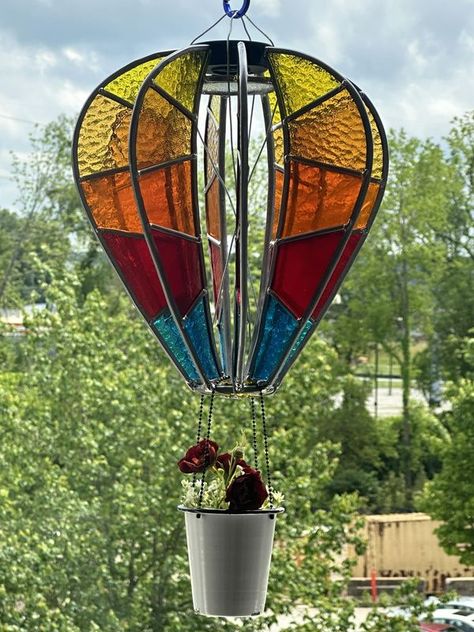 Stained Glass Patterns | Latest project, spinning hot air balloons(with solar light) | Facebook Stained Glass Hot Air Balloon, Glass Hot Air Balloon, Stained Glass Projects, Hot Air Balloons, Wind Spinners, Air Balloons, Stained Glass Patterns, Solar Lights, Hot Air Balloon