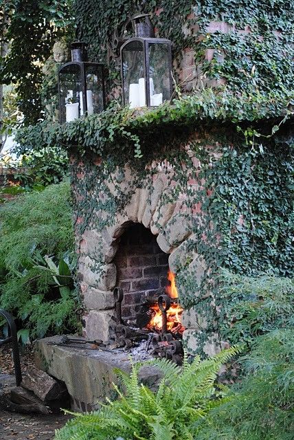 Summer style!! Magical outdoor garden fireplace with stacked stone! And ivy growing over and around it! Would be amazing for Summer solstice! Rustic Outdoor Fireplaces, Outdoor Fireplace Designs, Outdoor Living Rooms, Have Inspiration, Rustic Outdoor, Outdoor Fire, Outdoor Fireplace, Outdoor Rooms, Backyard Design