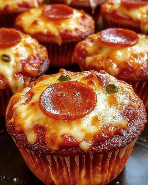 Deep Dish Pizza Cupcakes 🍕🧁 Ingredients: - 1 can refrigerated pizza dough - 1/2 cup pizza sauce - 1 1/2 cups shredded mozzarella cheese - 1/2 cup mini pepperoni slices (or regular pepperoni cut into small pieces) - 1/4 cup grated Parmesan cheese - 1/2 teaspoon Italian seasoning - 1/4 teaspoon garlic powder - Optional toppings: diced bell peppers, sliced olives, cooked sausage, or any favorite pizza toppings Instructions: 1. Preheat your oven to 375°F (190°C) and lightly grease a 12-cup muff... Pizza Cupcakes, Refrigerated Pizza Dough, Small Cupcakes, Fun Dinner, Deep Dish Pizza, Cookie Bar Recipes, Party Appetizer, How To Cook Sausage, Delicious Snacks Recipes