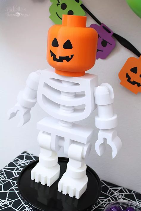 Lego brick or treat halloween party 6 Lego Halloween Birthday Party, Lego Halloween Decorations, Lego Trunk Or Treat Ideas, Lego Trunk Or Treat, Family Friendly Halloween Party, Halloween Lego, Halloween Papercraft, Lego Shirts, Diy Party Decor