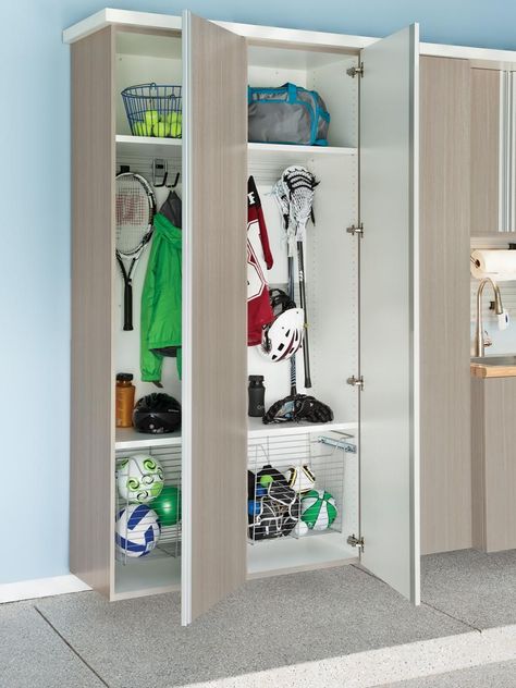 Garage Cabinets and Other Storage Tips For The Best Garage Ever Easy Garage Storage, Sports Equipment Storage, Garage Organization Systems, Sports Storage, Garage Organization Tips, Garage Organize, Playroom Storage, Equipment Storage, Garage Cabinets