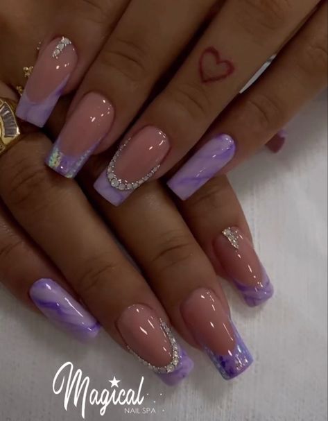 After fur nails, you probably thought that you had seen all the craziest nail art ideas. Purple French Tip Design, Purple Nail Art Designs Lavender, Nail Ideas Purple Lavender, Purple Coffin Nail Ideas, Lavender Nails With Glitter, Short Purple Nail Designs, Lavender Nail Ideas, Purple Nails With Glitter, Fur Nails