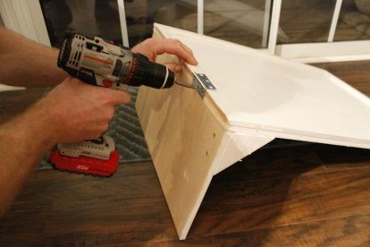 We had a second extra cabinet (an upper that we removed when taking down a wall) and decided to transform it into a tilt out trashcan. This was the much needed dog-proofing that our kitchen needed!    We started with a similar process with our open shelving. The upper cabinets were about 12 inches taller than the lowers needed to me. So, we cut the tops off, cut off 12 inches, then reattached the tops (our new counters will rest on here when they are installed)   We had to build a new… Plumbing Cover Ideas, Diy Trash Can Cabinet, Taking Down A Wall, Diy Trash Can, Tilt Out Trash Can, Pull Out Kitchen Cabinet, Cabinetry Ideas, Hide Trash Cans, Small American Kitchens