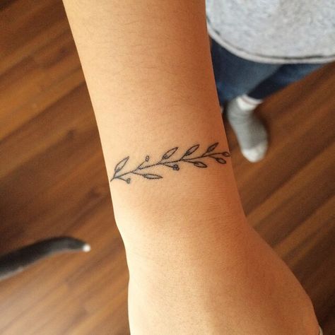 fern Branch Bracelet Tattoo, Exhale Tattoo, Inhale Exhale Tattoo, Expecto Patronum Tattoo, Olivia Harrison, Wrist Bracelet Tattoo, Olive Branch Tattoo, Branch Bracelet, Bracelet Tattoo