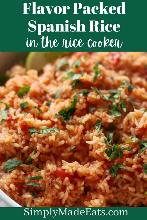 Rice cooker spanish rice topped with cilantro. Paella In Rice Cooker, Clean Eating Rice Recipes, Crock Pot Mexican Rice Crockpot, Mexican Rice In Rice Cooker Easy, Meals In Rice Cooker, Homemade Spanish Rice Easy, Rice Cooker Rice Recipes, Mexican Rice Crockpot, Spanish Rice In Rice Cooker