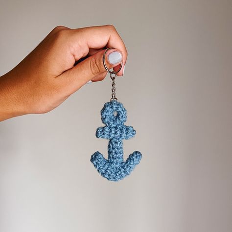 "Crocheted blue-grey anchor with metal loop keychain ⚓️ This coastal keychain is super lightweight - the perfect cozy nautical accessory for your keys or bag! Size: approximately 3\" x 2\" Each item is handmade with care using acrylic yarn and metal key chain ring attachment ✨" Key Ring Crochet, Crochet Keychain For Men, Crochet Anchor, Nautical Crochet, Anchor Keychain, Loop Keychain, Nautical Accessories, Crochet Fish, Anchor Pattern