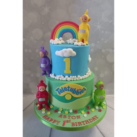 2 tier teletubbies cake for Ashtons 1st birthday Teletubbies 1st Birthday Cake, Teletubby Birthday Cake, Teletubbies Cupcakes, Teletubbies Birthday Party Decorations, Fraser Cake, Teletubbies Birthday Party, Teletubbies Birthday, Teletubbies Cake, Fancy Birthday Cakes