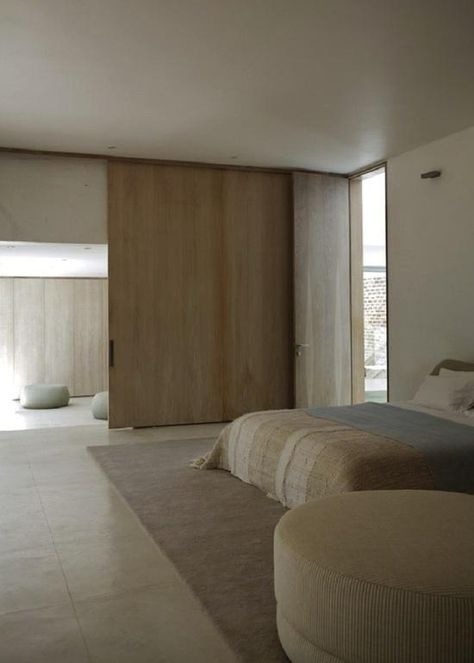 cool wood color + door    Silvio Rech and Lesley Carstens, INK Design Lab, minimalist house in Capetown, South Africa, neutral palette in bedroom, Remodeslista Soft Area Rug, Casa Open Space, Vstupná Hala, تصميم داخلي فاخر, غرفة ملابس, Hus Inspiration, Minimalist Interior, 100m, Cheap Home Decor