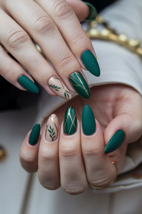 Embrace the beauty of autumn with these stunning olive green nails featuring delicate maple leaf designs. This chic style perfectly captures the essence of fall, blending rich green tones with warm, earthy accents. Whether you鈥檙e heading to a harvest festival or just want to celebrate the season, this look is both artistic and sophisticated. Get inspired by these fall nail ideas and elevate your nail game! Olive Nail Art Designs, Loki Nails Simple, Blue Fall Nails 2024, November Nails Green, Green Thanksgiving Nails, Green Gold Nails Ideas, Dark Green Matte Nails, Green Vine Nails, Earth Day Nails