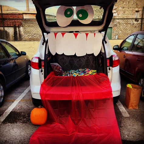 Crazy Tongue Trunk: How fun is this face with a long red tongue?  Source: Instagram user kingkingkris Church Trunk, Trunk Or Treat Ideas, Red Tongue, Mom Photos, Treat Ideas, Trunk Or Treat, Halloween Activities, Long Red, Party City