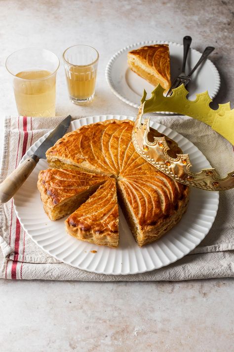 "Learn how to make this traditional French Galette des Rois enjoyed throughout January. Layers of crisp puff pastry surround a fragrant almond cream, resulting in a heavenly textural contrast. It's simple to make and utterly delicious- so much so you'll want to make it all year round. This Galette des Rois pastry is a traditional sweet treat enjoyed throughout France during January. Galette des Rois literally translates as King Cake and was baked to celebrate the arrival of the three wise men French King Cake, French Galette, Galette Des Rois Recipe, Almond Frangipane, French Dessert Recipes, The Three Wise Men, Puff Pastry Filling, French Baking, King Food