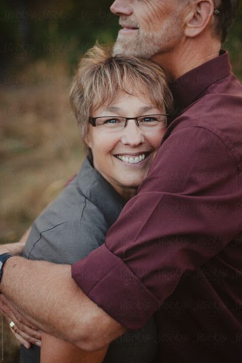 Middle Aged Woman Enjoying A Hug From Her Husband | Stocksy United Photos With Grandparents Grandchildren, Family Photos Adults, Old Couple Photography, Older Couple Poses, Older Couple Photography, Grandparent Photo, Older Couple, Middle Aged Woman, Family Portrait Poses