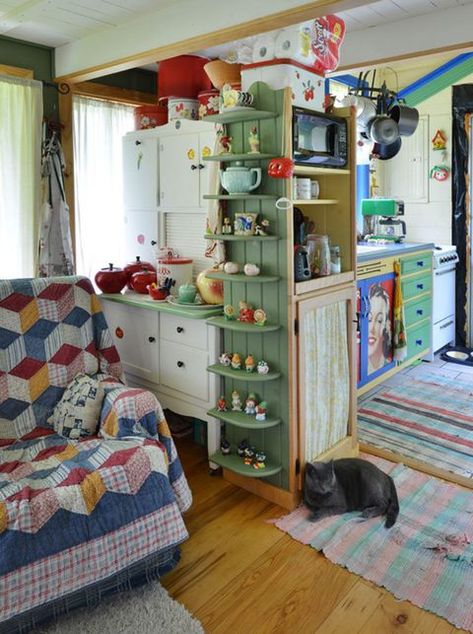 Wood, Room, Interior design, Floor, Textile, Flooring, Wood flooring, Cabinetry, Cupboard, Laminate flooring, Tiny Cottages, Rugs Colorful, Eclectic Cottage, Rich Living, Decor Eclectic, Room Painting, Storybook Cottage, House Aesthetic, Tiny Cottage