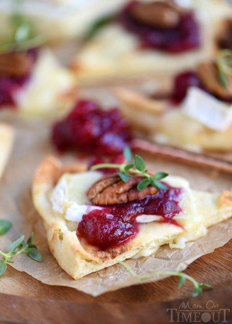 These Cranberry Pecan Brie Bites are perfect for holiday entertaining! Whether you make them for Thanksgiving, Christmas, or New Year's, no one will be able to resist the gooey melted brie, tart cranberry sauce, and toasted pecan atop a piece of naan! Easy and fabulous - just what holiday entertaining should be! // Mom On Timeout #appetizer #brie #cranberry #holidays #thanksgiving #christmas Cranberry Pecan Brie, Pecan Brie, Pecan Bites, Cranberry Fudge, Mom On Timeout, Brie Bites, Fall Appetizers, Christmas Friends, Appetizer Bites