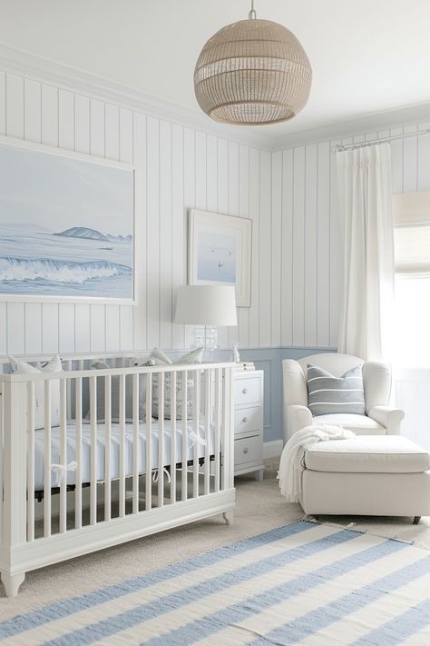 coastal nursery with light blue painted lower wall and striped wallpaper up top Striped Wallpaper Nursery, Light Blue Nursery, Calm Coastal, Nursery Closet Dividers, Blue Nursery Boy, Coastal Nursery, Beach Nursery, Simple Nursery, Baby Boy Bedroom