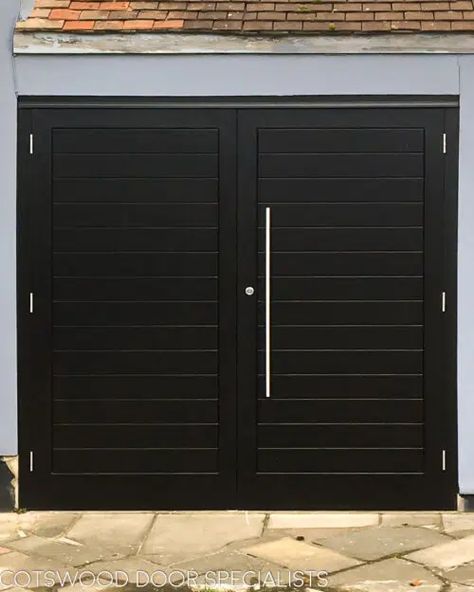 Contemporary Garage Doors, Contemporary Garage, Wooden Garage Doors, High Security Locks, Vertical Doors, Wooden Garage, Black Door, Horizontal Lines, Security Locks