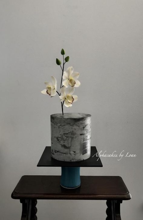 Buttercream concrete cake with sugar cymbidium orchid. Concrete Cake, Gray Wedding Cake, Patisserie Design, Single Tier Cake, Chocolate Cake Decoration, Modern Cakes, Cupcake Flavors, Simple Wedding Cake, Fashion Cakes