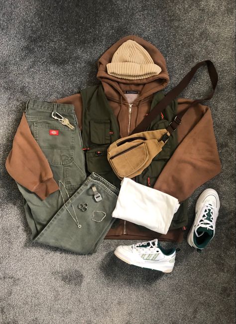 Laid out outfit consisting of Faded green dickies carpenters, brown brandy melville zip up hoodie, H&M rib knit beanie, thrifted brown crossbody bag and white and green Adi2000 Men’s Cool Outfits, Mens Fall Aesthetic, Brown Beanie Outfit Men, Brown Zip Up Hoodie Outfit Men, Like Green Aesthetic, Green And Brown Outfit Men, Brown Dickies Outfit, Men Style Clothing, Clothing Styles Aesthetic