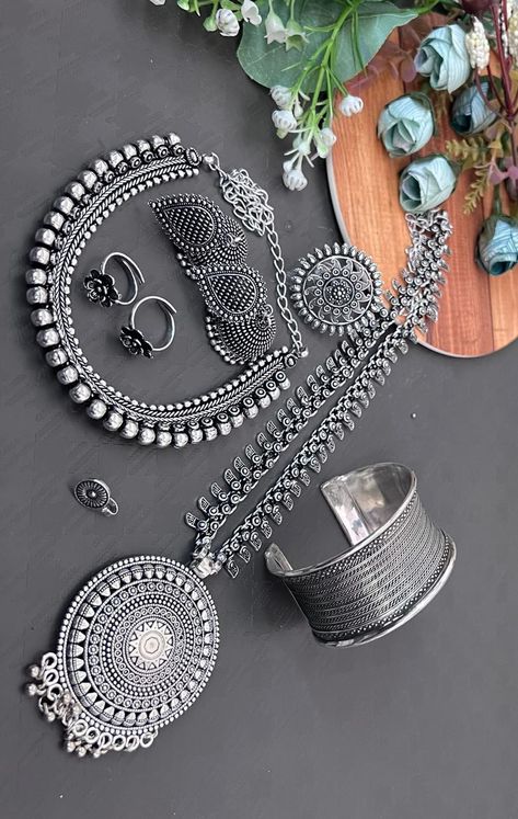 Premium quality long chain German silver pendant set with matching choker , Jhumkas , ring , nosepin , toering and kada 899₹ per set....⁵d59 Desi Necklace, Trendy Silver Jewelry, Oxidised Necklace, Nose Ring Jewelry, Oxidized Silver Necklace, Wedding Jewelry Sets Bridal Jewellery, Jewellery Photography, Indian Jewelry Earrings, Jewelry Photography Styling