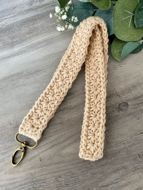 "Our Crochet Lanyards are soft , beautiful lanyards to help you keep up with your keys or hold your work badge! Crochet Lanyard/Badge Holders are made of 100% soft cotton yarn. Each Lanyard is about 1\" in width and 17.5\" in length. Our lanyards are made with the same star/floral design as our crochet key fobs. Perfect for bring a little boho style to your everyday wear.  We do customize orders so contact us with any requests or questions you may have!" Crochet Neck Lanyard, How To Crochet A Lanyard, Crochet Key Strap, Crochet Badge Holder Pattern Free, Crochet Keychain Strap, Crocheted Lanyards Patterns, Macrame Lanyard Pattern, Crochet Phone Lanyard, Lanyard Crochet Pattern Free