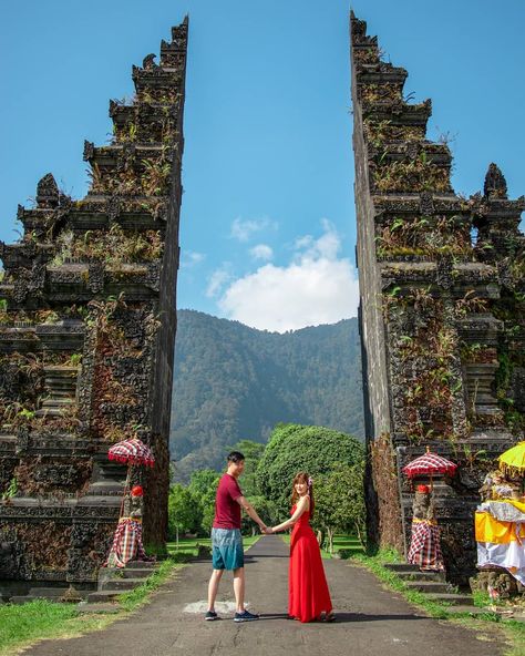 Travel & Lifestyle I Singapore on Instagram: “Discover Bali  l  Handara Gate⁣ ⁣ I got some friends asking if this is the famous reflection gate. The answer is no. ⁣ ⁣ There are 2 famous…” Handara Gate Bali Photography, Handara Gate Bali, Bali Poses, Bali Pics, Gate Of Heaven, Temple Entrance, Bali Temple, Bali Photos, Bali Outfit