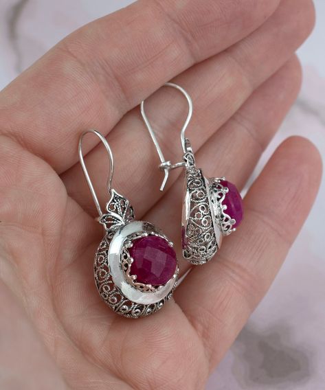 Add a touch of elegance to your ensemble with these handcrafted, filigree art, opaque ruby drop earrings! ✨ Every detail of these sterling silver treasures screams sophistication. Perfect for gifting or treating yourself – they even come in a beautiful gift box! 💝 Ready for that next compliments galore event? Click the link to shop now! 👉 https://nuel.ink/aihcZR #RubyElegance #HandcraftedJewelry #GiftIdeas #SilverSplendor #ShopNow 💎✨ Mehndi Lengha, Ruby Drop Earrings, Simple Silver Earrings, Hand Jewelry Rings, Handmade Jewlery, Silver Ring Designs, Bridal Diamond Jewellery, Stylish Earrings, Art Women