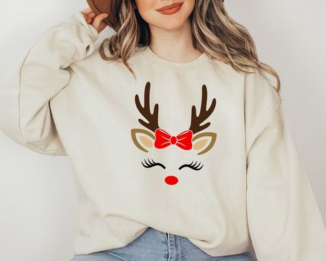 Christmas Sweatshirt, Reindeer Christmas Sweatshirt, Reindeer Face Sweatshirt, Reindeer Shirt for Woman, Christmas Shirt for Mama  ORDER INSTRUCTIONS  ➤ Check and review all listing photos. ➤ Pick up your item's size and color from drop down menus. ➤ Choose the quantity. ➤ Click "Add to Cart" button. ➤ Fill in the personalization box as recommended if provided.  ➤ You can go back to add more item or you can complete the checkout process. ➤ Click "Proceed to Check Out".  WHICH SIZE FITS ME BEST Reindeer Outfit Women, Reindeer Shirt Ideas, Christmas Sweatshirt Ideas, Reindeer Shirt, Christmas Craft Fair, Reindeer Face, Daycare Ideas, Christmas Guide, Spirit Week