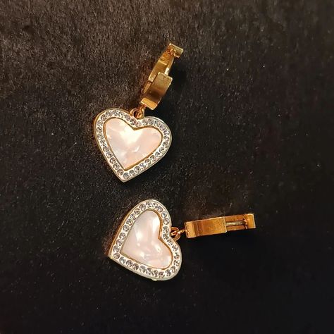 We are obsessed over how pretty these Little white heart earrings are 👁️🧿😍 And when beauty comes with good quality too. Well that's a win-win. Don't you think 👀😉 Check out these earrings in the finest quality and great features 💖✨ - Anti tarnish - Waterproof - Daily wear - Hypoallergenic Dm for queries. . . . . . . . . . . . . (Anti tarnish jewellery, hypoallergenic, pinterest aesthetic, daily wear, minimalistic) #aesthetic #antitarnishjewelry #hypoallergenic #foryoupage #instagood #smallbu... Tarnished Jewelry, White Heart, Heart Earrings, Daily Wear, Jewelry Stores, Beauty, How To Wear