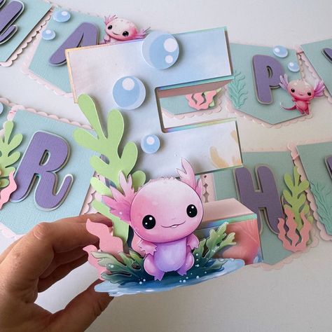 Beautiful Axolotl 3D letter. Perfect to decorate your table with the initial of the birthday child. Bring all the magic to your Axolotl Party or event.  DETAILS: *This listing is for 1 3d letter. If you need more than one please select it in quantity.  *This 3d letter is made in high quality CARDSTOCK PAPER (65-80LB)  *The size of the 3D letter is 8"  *All the images and details are placed on the letter with foam tape to give it a 3D look.  *There are two different designs on the pictures. Pleas Axolotl Party Decorations, Axolotl Birthday Party Decorations, Axolotl Birthday Party Ideas, Axolotl Party Ideas, Biology Party, Axolotl Birthday Party, Axolotl Party, Wooden Letter Ideas, Birthday Treat Bags