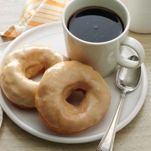 Glazed Doughnuts Glazed Doughnuts Recipe, Doughnuts Recipe, Glazed Doughnuts, Doughnut Recipe, Glaze Recipe, Sweet Roll, Donut Recipes, A Cup Of Coffee, Taste Of Home