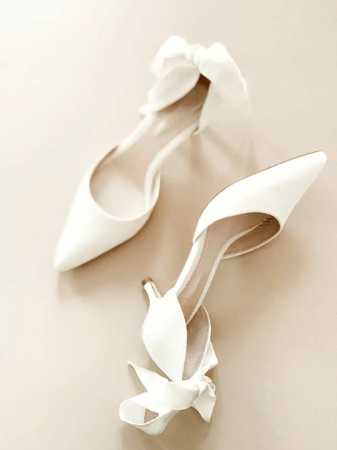 The Perfect Wedding Shoes for Your Walk Down the Isle Wedding Kitten Heels For Bride, Low Heel Bridal Shoes Elegant, Bride Shoes Kitten Heel, Classic Wedding Heels, Wedding Shoes Bride Small Heel, Classic Wedding Reception Dress, Wedding Shoes Bride Kitten Heel, Bridal Shoes Kitten Heel, White Kitten Heels Wedding Shoes