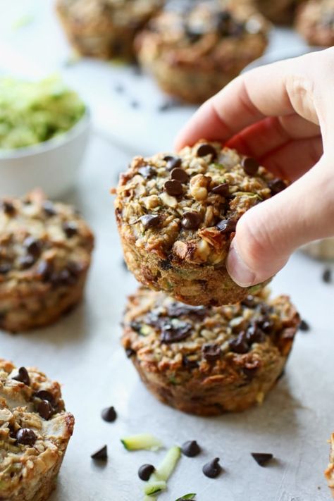 Zucchini Banana Baked Oatmeal Cups | A healthy and easy grab-and-go breakfast option for your busiest mornings! These Zucchini Banana Baked Oatmeal Cups are quick to make, meal prep friendly and great for kids & adults. || The Real Food Dietitians #glutenfreebreakfast #glutenfreerecipes #mealprepideas #easymealprep #healthymuffins #therealfoodrds Banana Zucchini Protein Muffins, Zucchini Banana Muffins, Yogurt Breakfast Bowl, Banana Zucchini Muffins, Greek Yogurt Breakfast, Oat Cookie Recipe, Pumpkin Pie Protein, Easy Breakfast Options, Zucchini Banana