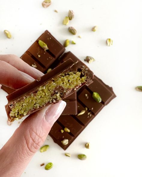 𝗗𝗨𝗕𝗔𝗜 𝗖𝗛𝗢𝗖𝗢𝗟𝗔𝗧𝗘 ‌ I just love this viral Dubai chocolate bar! Being a bit of a chocoholic, I can’t get enough of the unique flavors in this pistachio-filled bar. You are going to love making this treat, and it’s really easy. ‌ What is Dubai chocolate made of? ‌ Made famous on TikTok, the Dubai chocolate bar consists of milk chocolate surrounding knafeh, also called kunafa. This creamy pistachio filling, which tastes hazelnutty, is made with shreds of kataifi that add a crunchy texture. ‌ Don’... Dubai Viral Kunafa Chocolate Recipe, Pistachio Kunafa, Pistachio Filling, Dubai Chocolate, How To Make Chocolate, Milk Chocolate, Pretty Food, Chocolate Bar, Pistachio